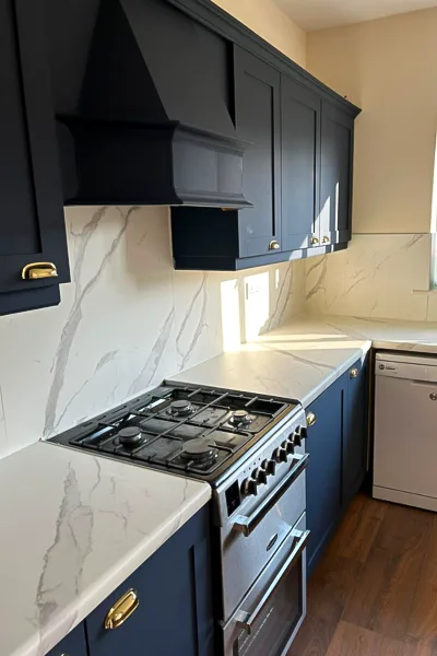 A kitchen splashback elegantly transformed with high-quality vinyl wrap, showcasing intricate design and flawless installation by Iconic Kitchen Wraps, Dublin's premier vinyl wrapping service